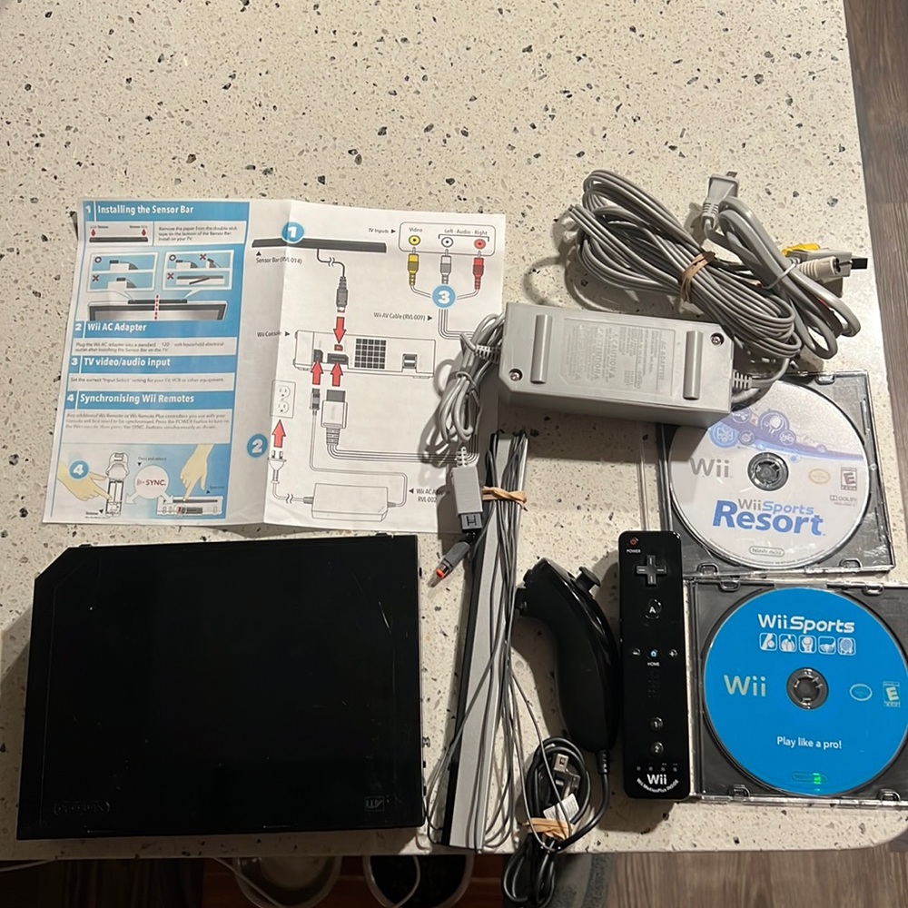 Wii with controller + 2 games